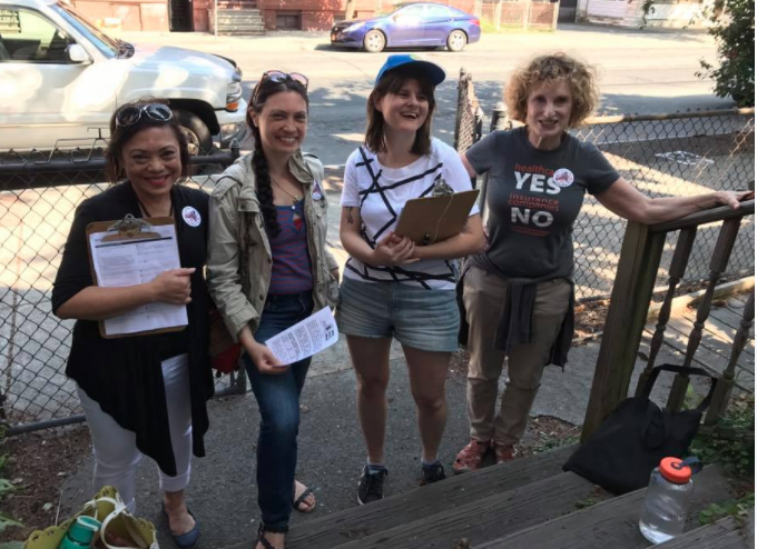 Volunteers engaging with community members